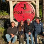Guests enjoying a break in the dense Alaskan forest around Eagle Wings Lodge